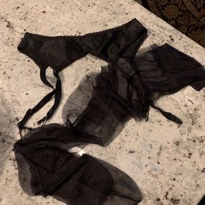 Black satin garter belt and silky sheer black stockings, small